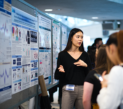 Kristina Zhang presents her poster at the Research Institute Retreat