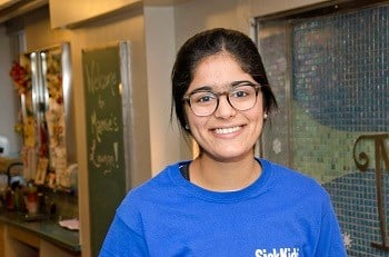 SickKids Volunteer Gurrattan smiling for a picture