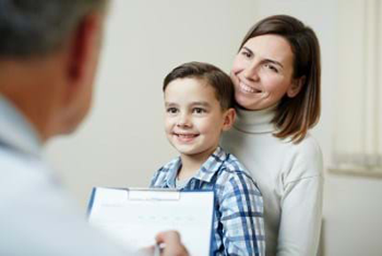 Child and mom participate in a consult