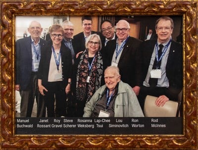Group photo of Manuel Buchwald, Janet Rossant, Roy Gravel, Steve Scherer, Rosanna Weksberg, Lap-Chee Tsui, Lou Siminovitch, Ron Worton and Rod McInnes (left to right).
