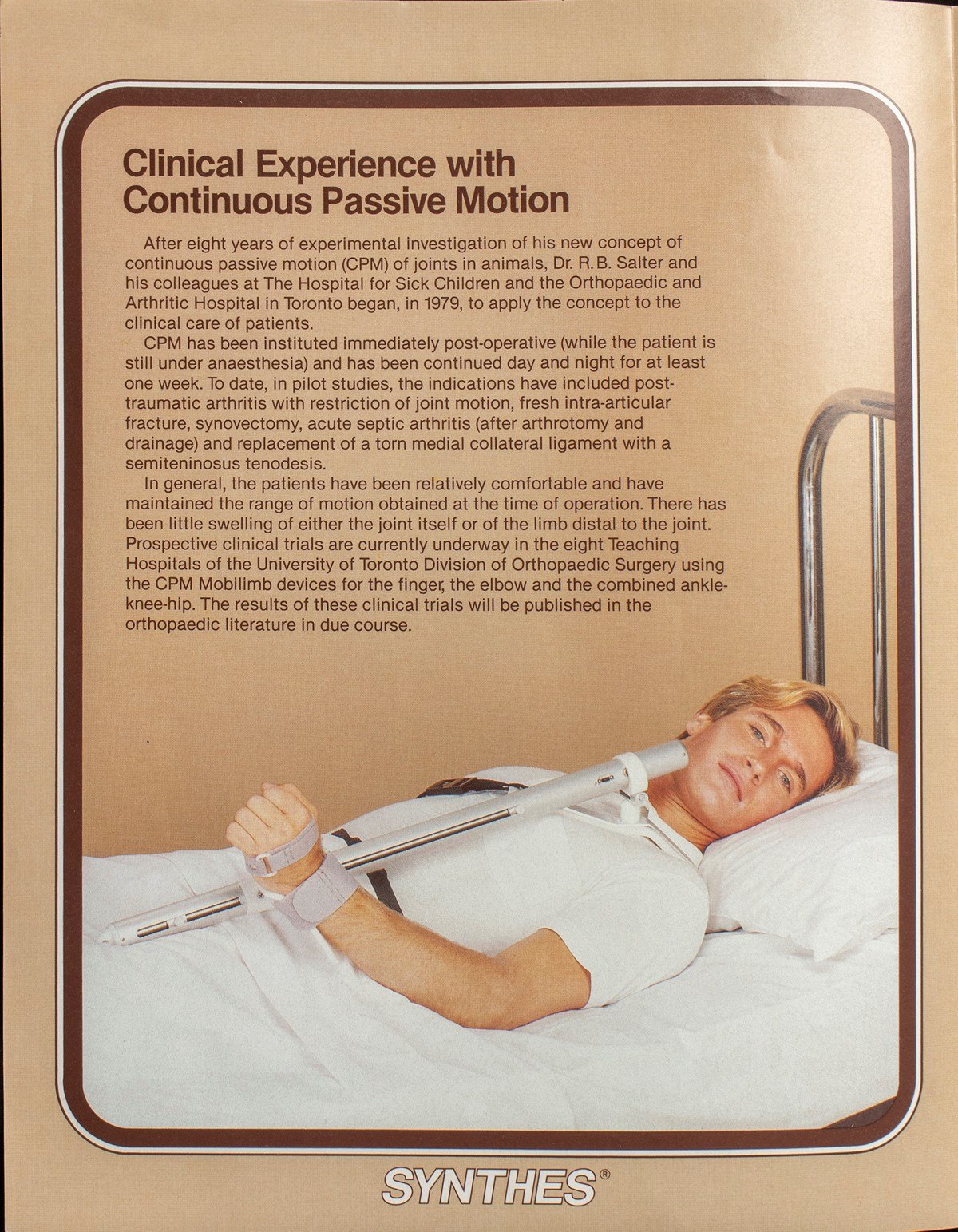 A poster of a man lying in a bed and wearing an orthotic device on arm that is connected to a bar that restricts his range of motion vertically. The headline reads "Clinical experience with continuous passive motion".
