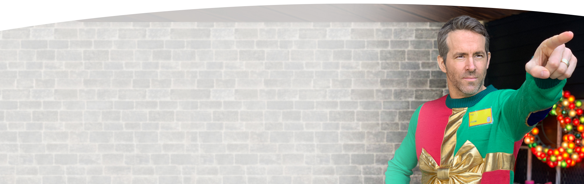 Ryan Reynolds in a holiday sweater