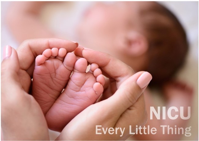 SickKids NICU - Adult hands cradling a baby's feet
