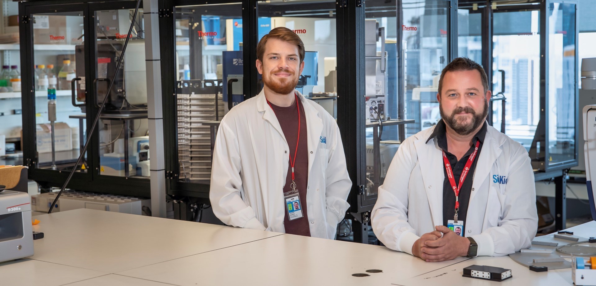 Technician Jonathan Sayewich and Facility Manager Chris Fladd in the SPARC Drug Discovery Facility at SickKids. 