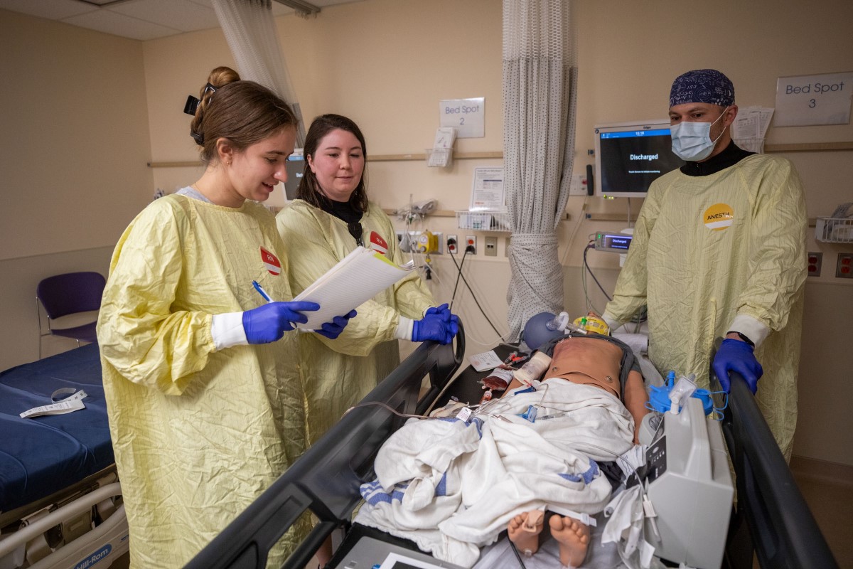 Staff participate in a simulation training session.