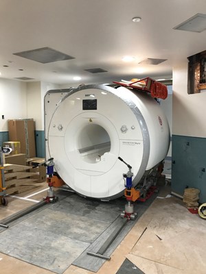 MRI in a hallway on a track.
