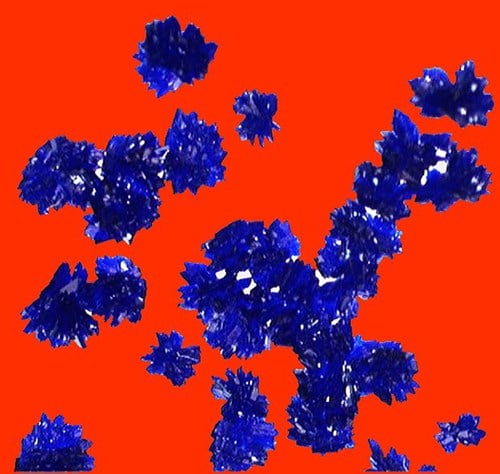 Red background with blue splotches.