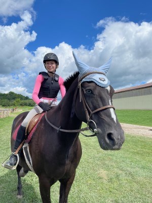 Alexandra riding a horse