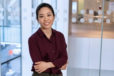 Dr. Jennifer Quon smiling and posing for a photo inside the Patient Support Centre.