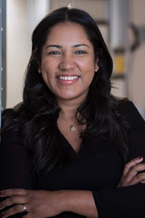 A headshot of Dr. Joana Dos Santos smiling.