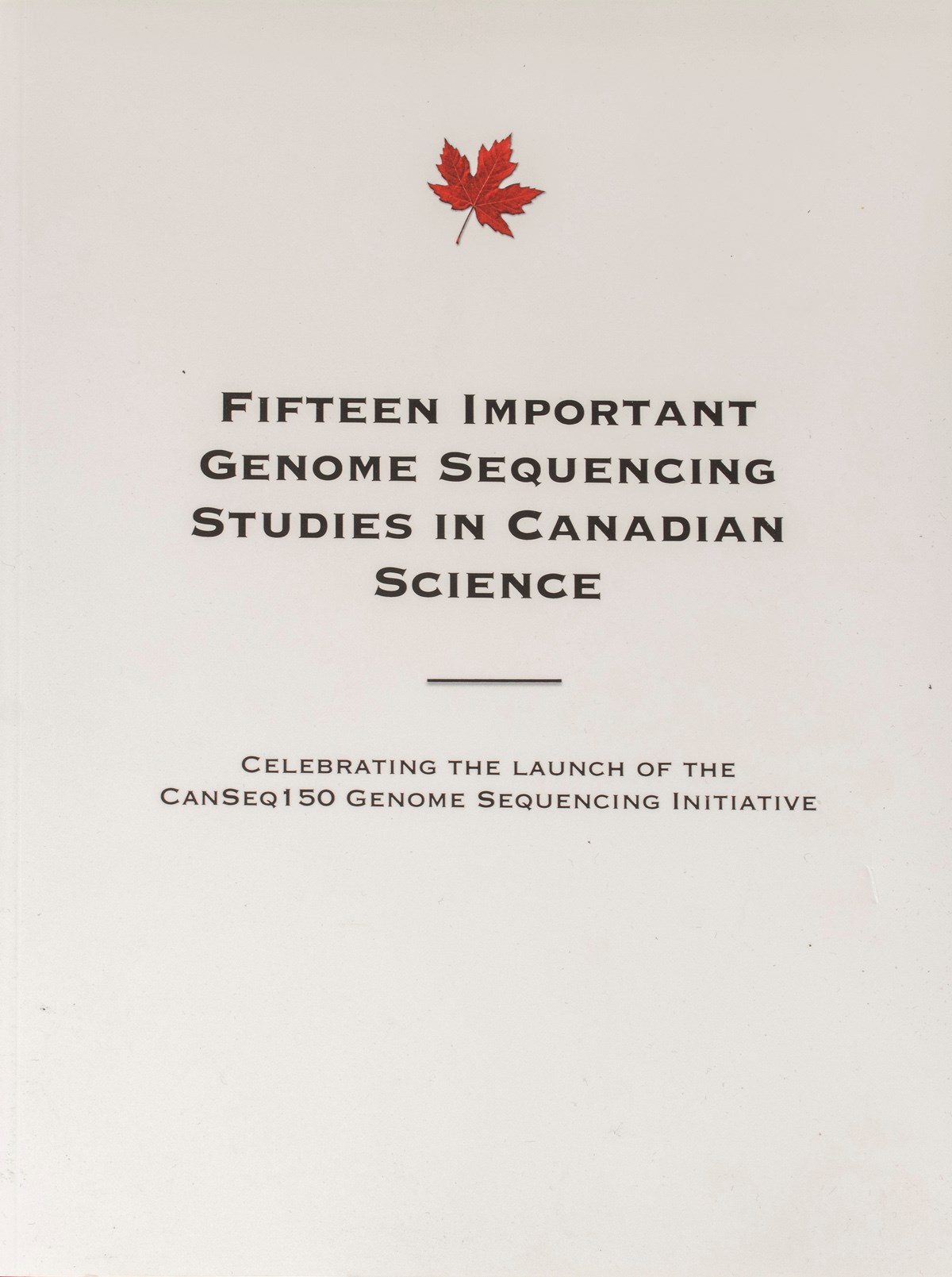 The cover page of "Fifteen Important Genome Sequencing Studies in Canadian Science". The subtext reads, "Celebrating the launch of the CanSeq150 Genome Sequencing Initiative". Above the title is a red maple leaf. 