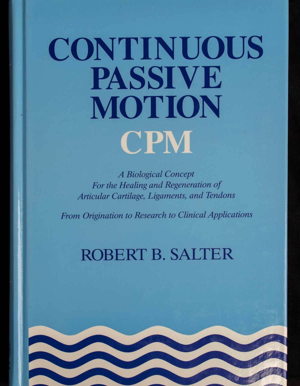 A book cover that reads, "Continuous Passive Motion (CPM): A biological concept for healing and regeneration of articular cartilage, ligaments, and tendons - From origination to Research to Clinical Applications. Robert B. Salter".